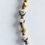 Farbe
Creme, Schwarz, Gold