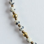 Farbe:
Creme, Schwarz, Gold