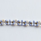 Farbe
Weiß, Perlmutt, Blau, Gold