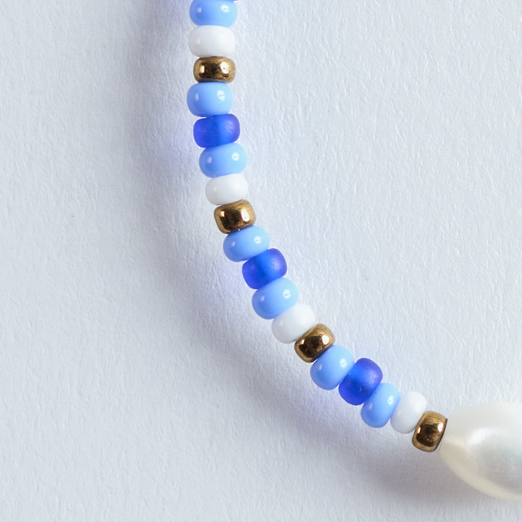 Farbe
Hellblau, Dunkelblau, Weiß, Gold